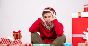 https://www.freepik.com/free-photo/front-view-depressed-young-man-sitting-around-xmas-gifts_11818340.htm#page=1&query=holiday%20depression&position=35&from_view=search