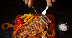 https://www.freepik.com/free-photo/grilled-beef-steak-dark-wooden-surface_14454663.htm