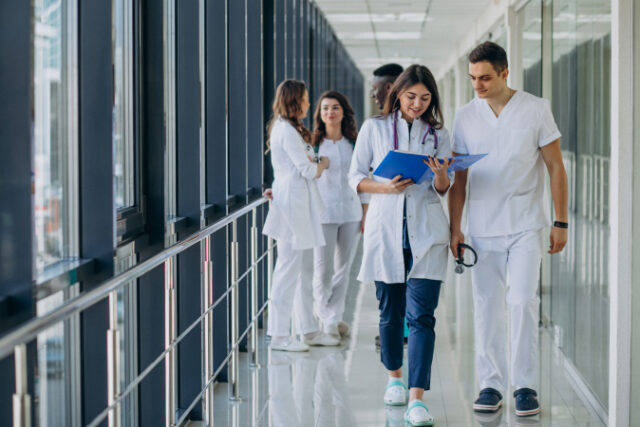 https://www.freepik.com/free-photo/team-young-specialist-doctors-standing-corridor-hospital_7869339.htm#page=1&query=doctors%20nurses&position=35&from_view=search