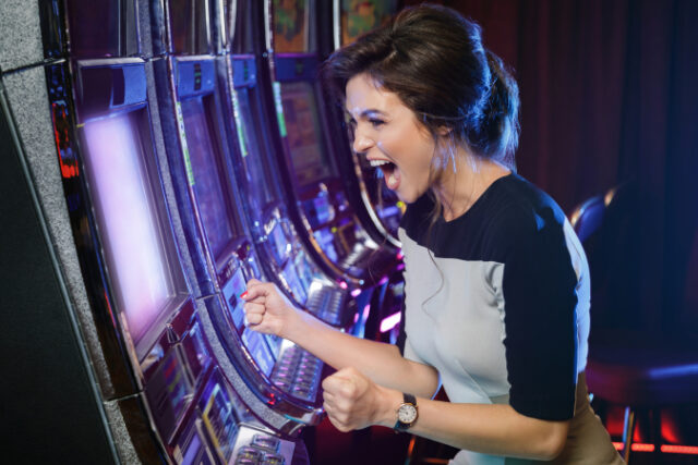 https://www.freepik.com/premium-photo/woman-is-happy-her-win-slot-machines_7427889.htm#page=1&query=slot%20machine&position=16&from_view=search