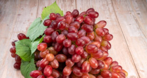 https://www.freepik.com/premium-photo/red-grape-with-leaves-wooden-background-bunch-fresh-red-grapes-with-leaves_21380589.htm#query=australian%20wines&position=12&from_view=search