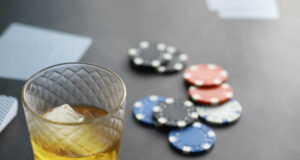 https://www.freepik.com/premium-photo/gambling-card-games-money-texas-hold-em-poker-cards-hand-playing-chips-deck-cards-alcohol-glass_22576099.htm#query=gambling&position=48&from_view=search