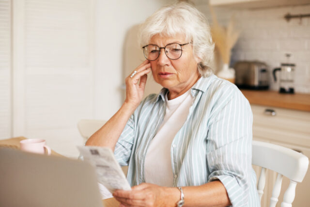 https://www.freepik.com/free-photo/portrait-frustrated-gray-haired-female-pensioner-wearing-eyeglasses-sitting-kitchen-table-with-laptop-holding-bill-touching-face-shocked-with-amount-total-sum-electricity_11200030.htm#query=looking%20at%20bills&position=0&from_view=search