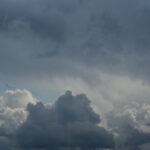 vecteezy_rain-clouds-illuminated-by-sun-background__96