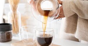 https://www.vecteezy.com/photo/3220383-young-woman-brewing-coffee-in-coffee-pot-pouring-coffee-to-the-glass
