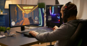 https://www.freepik.com/free-photo/videogamer-winning-first-person-shooter-tournament-using-rgb-keyboard-professional-headphones-pro-player-man-talking-with-other-players-online-game-competition-powerful-computer_15962828.htm#query=gamer&position=14&from_view=search