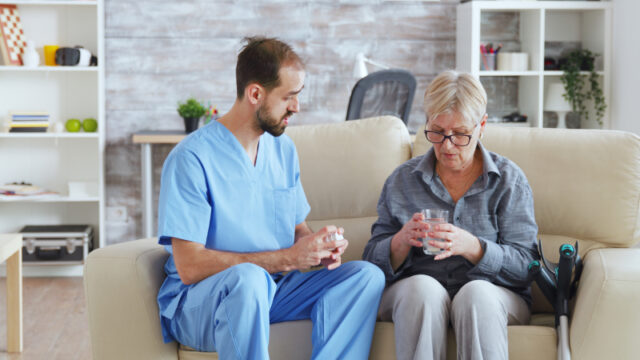 https://www.freepik.com/free-photo/male-nurse-sitting-couch-with-senior-woman-giving-her-medical-treatment-nursing-home_19349326.htm#query=senior%20pills&position=16&from_view=search