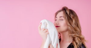 https://www.vecteezy.com/photo/4334927-beautiful-woman-smelling-clean-clothes-isolated-on-pink-background