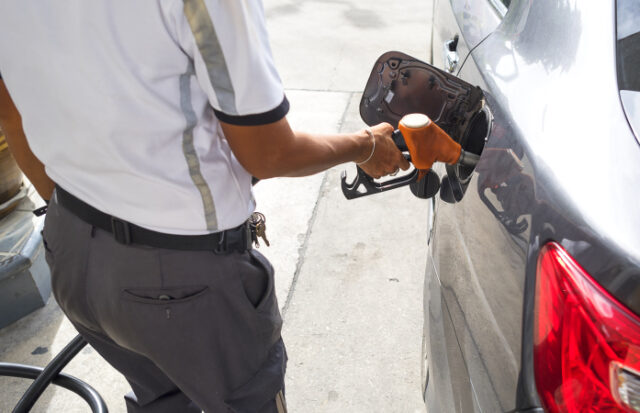 https://www.vecteezy.com/photo/2221608-man-pumping-gasoline-fuel-in-car-at-a-gas-station