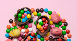 https://www.vecteezy.com/photo/3492661-chocolate-easter-eggs-and-sweet-candies-on-pink-background-with-copy-space