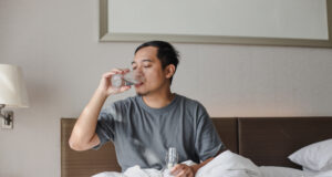 https://www.vecteezy.com/photo/6671138-man-sitting-on-the-bed-and-drinking-a-glass-of-mineral-water-after-wake-up-from-sleep