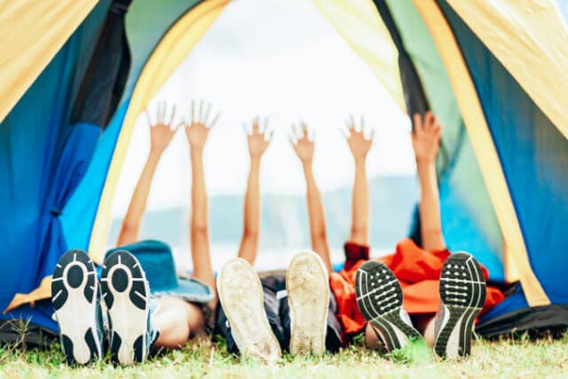 https://www.vecteezy.com/photo/1223387-friends-having-fun-in-camping-tent