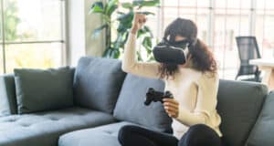 https://www.vecteezy.com/photo/5685332-latin-woman-using-a-virtual-reality-headset-on-sofa