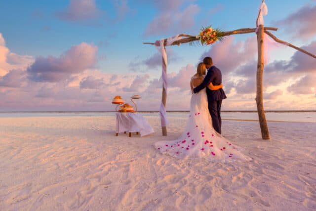 https://www.vecteezy.com/photo/6933120-the-bride-and-groom-under-wedding-arch-on-beach-romantic-wedding-background-amazing-beach-sunset-infinity-sea-view-romantic-clouds-sky-idyllic-destination-honeymoon