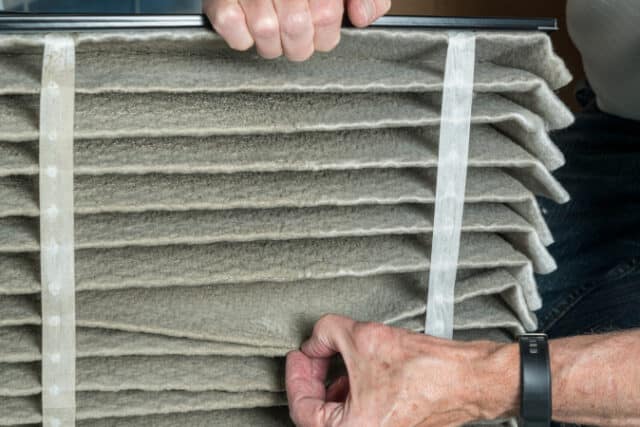 https://www.freepik.com/premium-photo/senior-caucasian-man-looking-dust-folded-dirty-air-filter-hvac-furnace-system-basement-home_25590104.htm#query=furnace%20filter&position=21&from_view=search