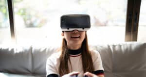 https://www.vecteezy.com/photo/8570652-concept-of-technology-gaming-entertainment-and-people-asian-woman-enjoying-virtual-reality-glasses-while-relaxing-in-living-room-happy-young-guy-with-vr-headset-playing-video-game-at-home