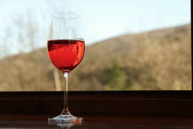 https://www.freepik.com/free-photo/glass-red-wine-stands-wooden-windowsill_26661106.htm#page=2&query=rose%20wine&position=47&from_view=search