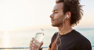 https://www.freepik.com/free-photo/outdoor-shot-stylish-dark-skinned-male-athlete-drinking-water-out-plastic-bottle-after-cardio-workout-runner-hydrating-during-training-by-sea-morning-sunlight_9696864.htm#query=hydration&position=45&from_view=search