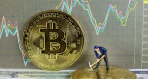 https://www.vecteezy.com/photo/7021620-a-little-miner-is-digging-on-golden-bitcoin-with-dollar-and-graph-background-conceptual-image-of-bitcoin-mining-and-trading