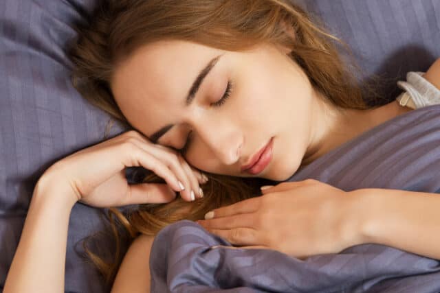 https://www.vecteezy.com/photo/7449937-beautiful-girl-sleeps-in-the-bedroom-sleepinf-woman-in-bed-close-up-young-beautiful-woman-sleeping-portrait-of-the-beautiful-young-woman-sleeping-in-dark-bed