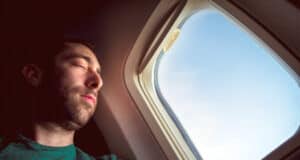 https://www.vecteezy.com/photo/3690615-young-man-resting-and-sleeping-on-an-airplane