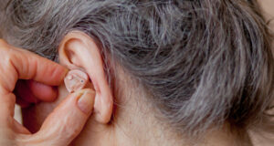 https://www.freepik.com/premium-photo/closeup-senior-woman-inserting-hearing-aid-her-ears_11534061.htm#query=hearing%20aid&from_query=hearin%20aid&position=19&from_view=search