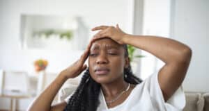https://www.freepik.com/free-photo/portrait-young-black-girl-sitting-couch-home-with-headache-pain-beautiful-woman-suffering-from-chronic-daily-headaches-sad-woman-holding-her-head-because-sinus-pain_27156398.htm#query=migraine&position=48&from_view=search