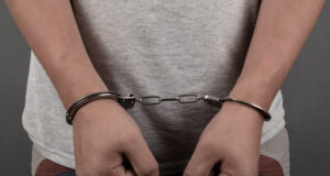https://www.vecteezy.com/photo/2886053-man-handcuffed-closeup-arrest-of-a-criminal