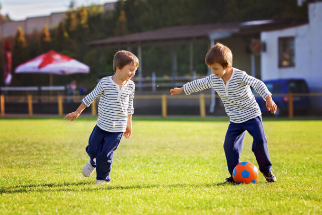 https://www.vecteezy.com/photo/918068-two-cute-little-boys-playing-football
