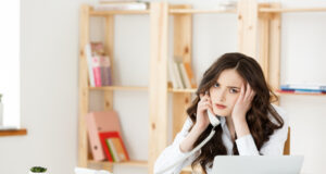 https://www.freepik.com/free-photo/tired-beautiful-businesswoman-holding-hand-head-while-working-computer-some-business-documents-bright-office_27262727.htm#query=unhappy%20office%20worker&position=23&from_view=search