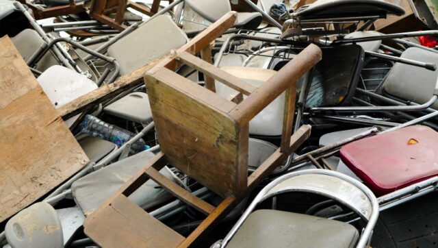 https://www.vecteezy.com/photo/4742320-the-pile-of-broken-folding-chairs-discarded-folding-chair-in-the-messy-disposal-the-aged-school-furniture-in-the-junk