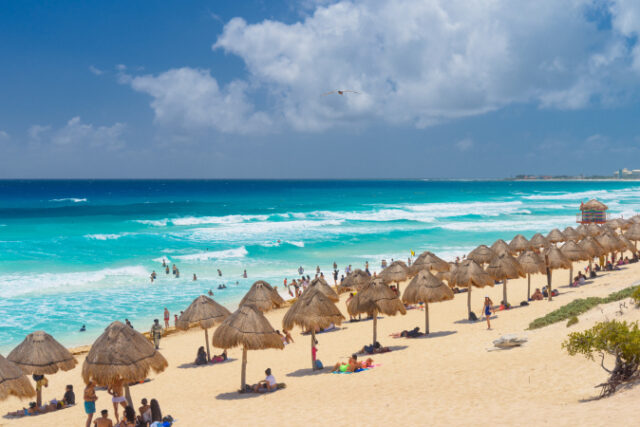 https://www.vecteezy.com/photo/10342139-umbrelas-on-a-sandy-beach-with-azure-water-on-a-sunny-day-near-cancun-mexico