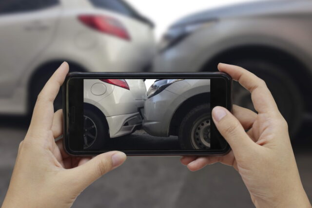 https://www.vecteezy.com/photo/7095555-hand-holding-smart-phone-take-a-photo-at-the-scene-of-a-car-crash-car-accident-for-insurance