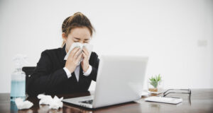 https://www.vecteezy.com/photo/9312180-sick-young-asian-business-woman-sitting-alone-at-work-sneeze