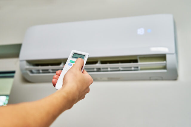 https://www.vecteezy.com/photo/14883633-hand-adjusting-temperature-on-air-conditioner