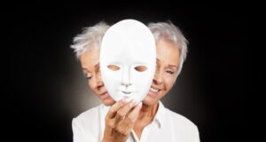 https://www.vecteezy.com/photo/6240496-older-woman-hiding-happy-and-sad-face-behind-mask