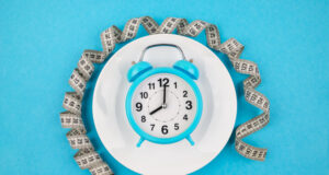 https://www.freepik.com/premium-photo/top-view-photo-measuring-tape-blue-alarm-clock-plate-blue-background-concept-weight-loss-diet_35649548.htm#query=intermittent%20fasting&position=10&from_view=search&track=sph