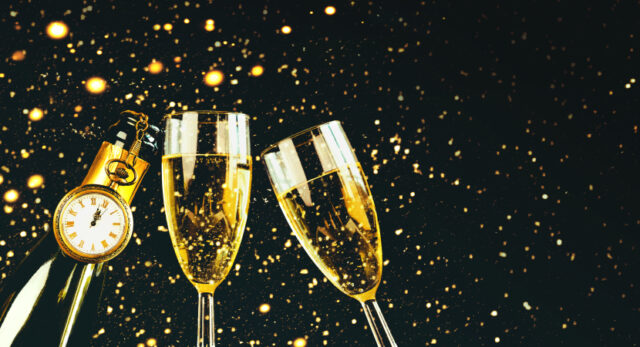 https://www.vecteezy.com/photo/14671241-happy-new-year-champagne-bottle-with-two-glasses-sparkling-glitter-with-copy-space-new-years-eve-celebration-concept-background