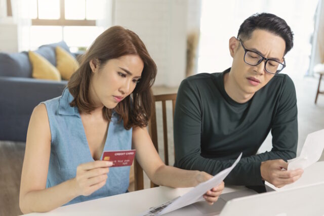 https://www.freepik.com/premium-photo/serious-asian-husband-checking-analyzing-statement-utilities-bills-sitting-together-home_15829312.htm#from_view=detail_alsolike