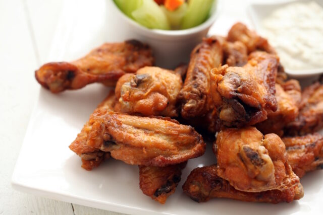https://www.freepik.com/free-photo/chicken-wings-with-sauce-vegetables_5909250.htm#query=chicken%20wings&position=22&from_view=search&track=sph