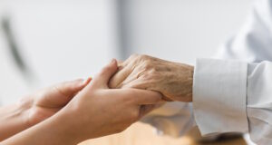 https://www.freepik.com/free-photo/nurse-holding-senior-man-s-hands-comfort_10892969.htm#query=hospice&position=44&from_view=search&track=sph