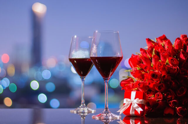 https://www.vecteezy.com/photo/15229733-two-glasss-of-red-wine-and-red-roses-bouquet-with-red-gift-box-on-table-with-colorful-city-bokeh-lights-for-anniversary-or-valentine-day-concept