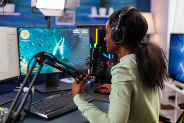 https://www.freepik.com/free-photo/african-esports-player-talking-with-team-during-live-space-shooter-stream-competiton-streaming-viral-video-games-fun-using-headphones-keyboard-online-championship_18590602.htm#query=gaming%20microphones&position=20&from_view=search&track=ais
