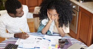 https://www.freepik.com/free-photo/african-family-doing-paperwork-together-stressed-young-woman-holding-hands-her-face-looking-depressed-shocked-with-amount-family-expenses-her-supportive-husband-trying-soothe-her_9535274.htm#page=2&query=couple%20debt&position=24&from_view=search&track=ais