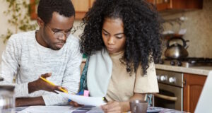 https://www.freepik.com/free-photo/indignant-african-husband-gesturing-with-pencil-reproaching-his-wife-doing-mistake-while-calculating-bills_9956713.htm#query=couple%20discuss%20for%20money&position=44&from_view=search&track=ais