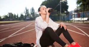https://www.freepik.com/free-photo/beautiful-girl-wireless-earphones-drinking-pure-water-while-spending-time-running-track-stadium_25238383.htm#query=resting%20runner&position=34&from_view=search&track=ais