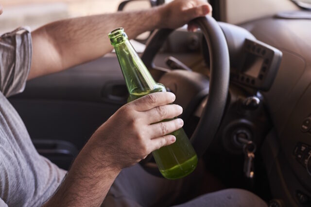 https://www.freepik.com/free-photo/bottle-beer-man-s-hands-driving-car-during-daytime_17248912.htm#query=drunk%20driver&position=4&from_view=search&track=ais