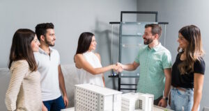 https://www.freepik.com/free-photo/business-partners-shaking-hands-with-engineer-by-architectural-model-meeting_27998945.htm#page=3&query=realestate&position=44&from_view=search&track=ais?log-in=email