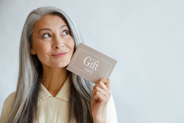 https://www.freepik.com/premium-photo/dreamful-grey-haired-asian-woman-holds-gift-card-near-face-standing-light-grey-background-studio-space-text-shopping-certificate_17813954.htm#query=adult%20gift%20cards&position=40&from_view=search&track=ais