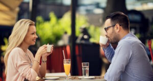 https://www.freepik.com/free-photo/happy-couple-communicating-while-relaxing-cafe-drinking-coffee_25630209.htm#query=first%20date&position=22&from_view=search&track=ais